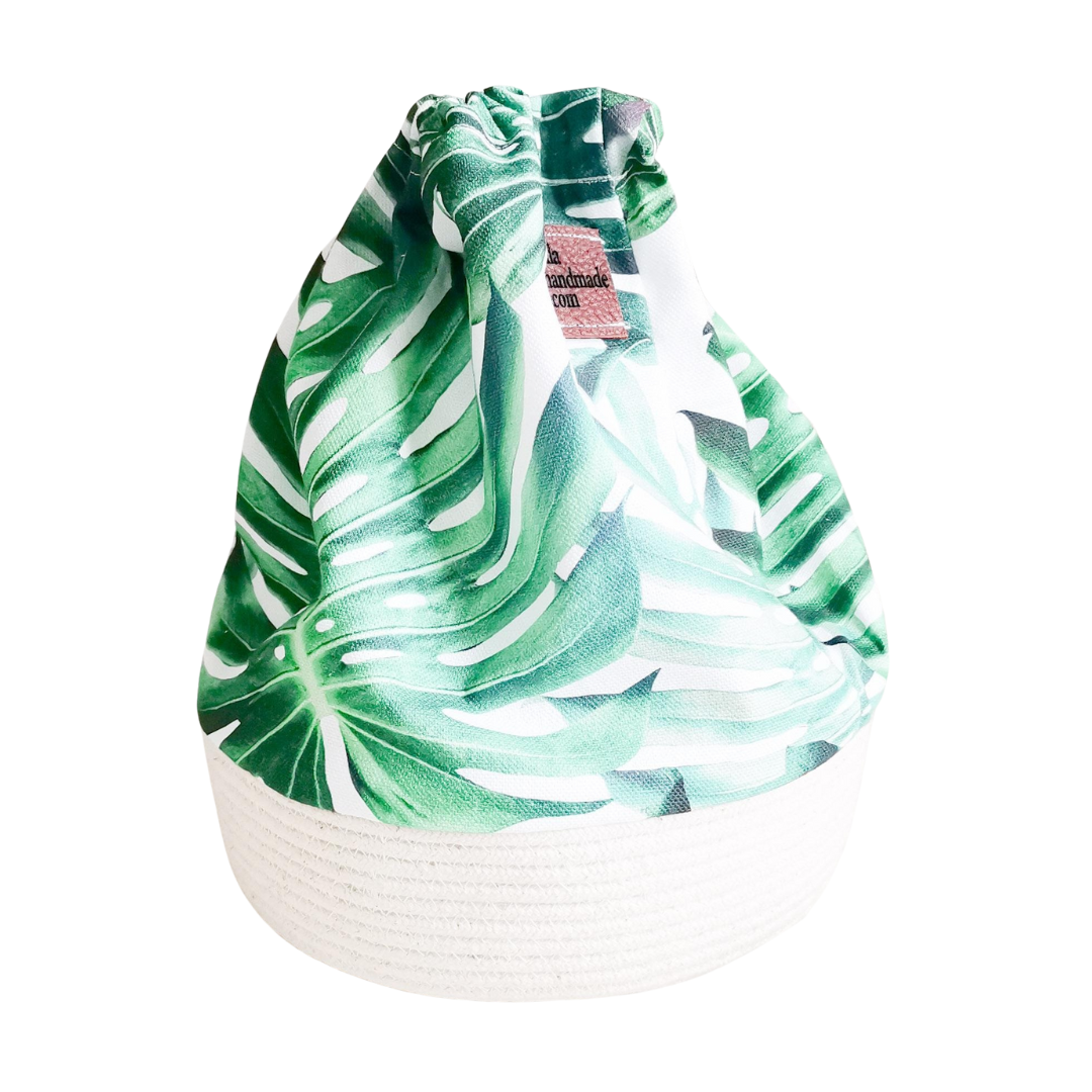 Drawstring Basket bags used as packaging. Cotton rope as base. Botanical fabric as top.