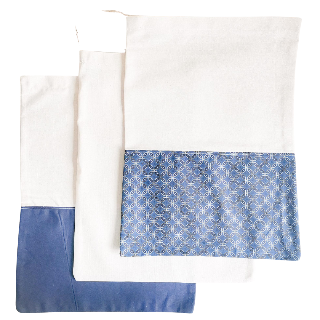 Cotton Calico drawstring bags used for eco-friendly packaging. Available in different sizes & colours.