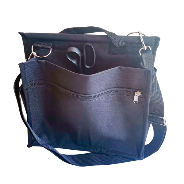Craft Caddy with multiple inner & outer pockets, carry handle & adjustable webbing carry sling. Made with black PVC canvas. 