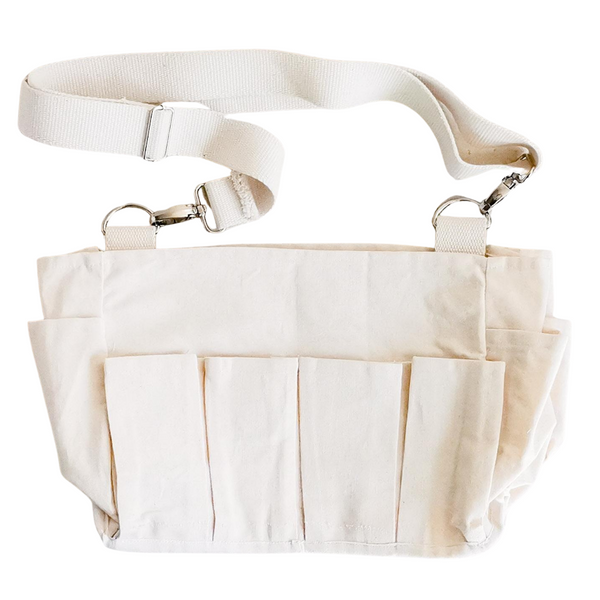 Craft Caddy with multiple inner & outer pockets, carry handle & adjustable webbing carry sling. Made with natural white cotton canvas. 