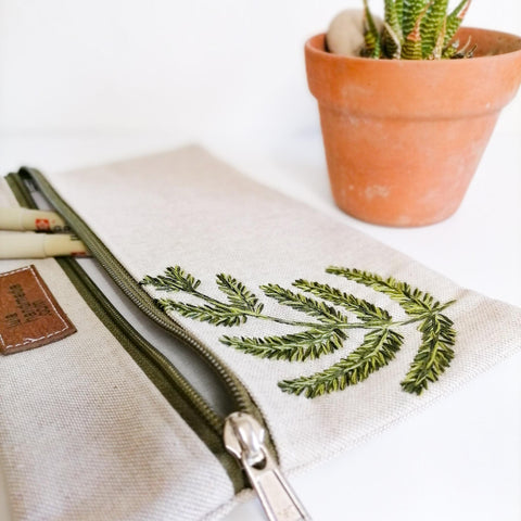 Hand embroidered green fern leaf on linen zipper pouch