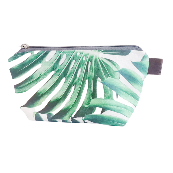 Lined Fabric Cosmetic zipper pouch made with White monstera printed fabric